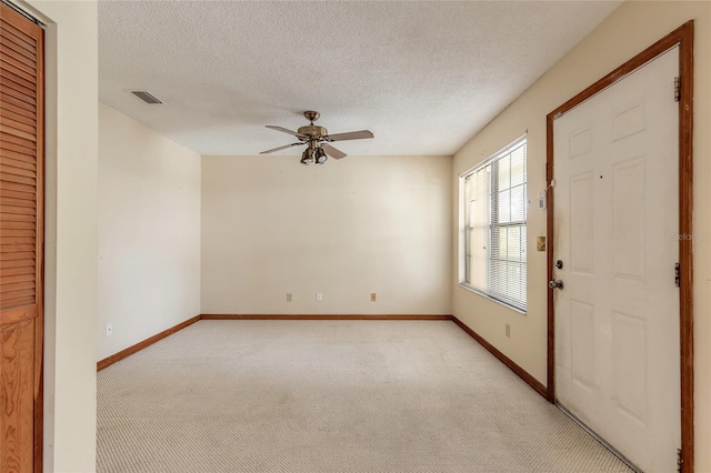 840 Center Ave Unit 280, Daytona Beach, FL 32117 - empty room with light carpet, a ceiling fan, and a textured ceiling