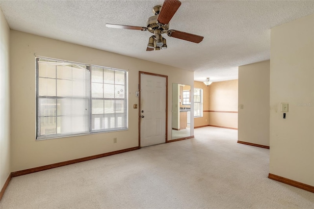 840 Center Ave Unit 280, Daytona Beach, FL 32117 - unfurnished room featuring carpet floors, a ceiling fan, and a textured ceiling