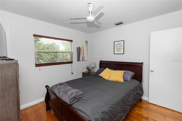 18 S Shell Rd, Debary, FL 32713 - bedroom featuring wood finished floors, baseboards, and ceiling fan