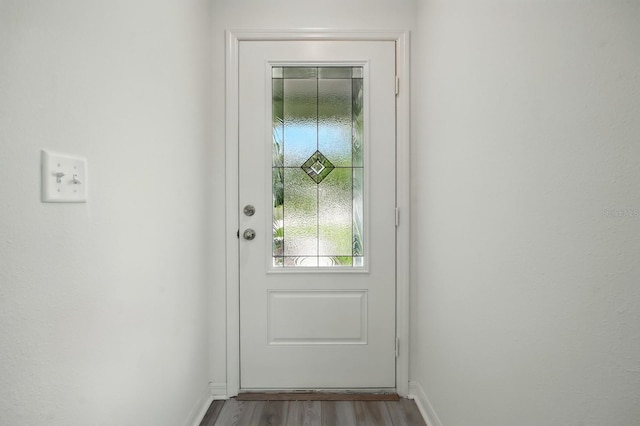 1161 Kenway Ave, Deltona, FL 32738 - doorway featuring wood finished floors and baseboards