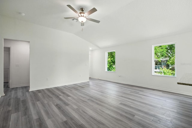 1161 Kenway Ave, Deltona, FL 32738 - spare room with vaulted ceiling, a ceiling fan, baseboards, wood finished floors, and a smoke detector