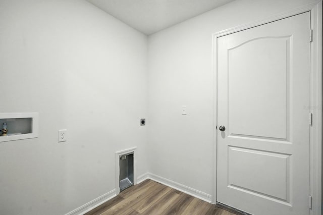 1161 Kenway Ave, Deltona, FL 32738 - laundry room with electric dryer hookup, hookup for a washing machine, dark wood finished floors, and baseboards