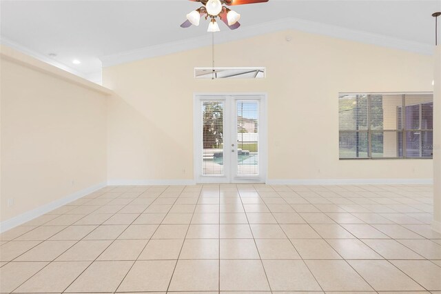 2263 Catbriar Way, Oviedo, FL 32765 - spare room featuring ceiling fan, light tile patterned floors, vaulted ceiling, and crown molding