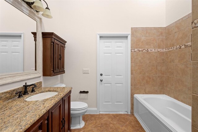 2263 Catbriar Way, Oviedo, FL 32765 - bathroom with vanity, tile patterned floors, and washtub / shower combination