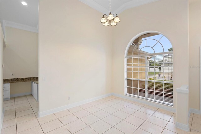 2263 Catbriar Way, Oviedo, FL 32765 - unfurnished dining area featuring ornamental molding, light tile patterned floors, and a chandelier
