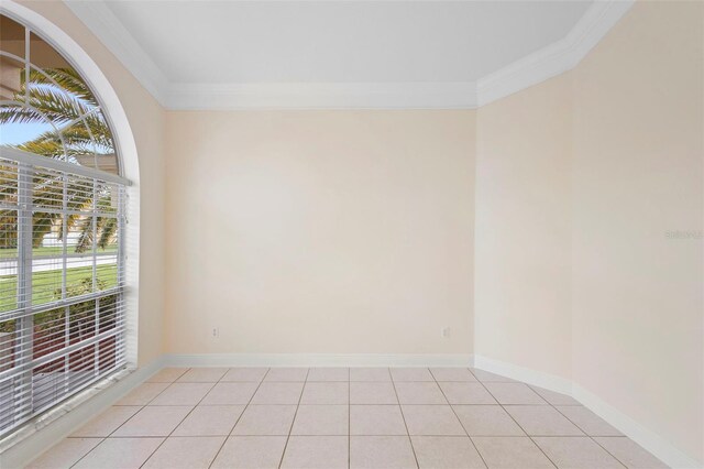 2263 Catbriar Way, Oviedo, FL 32765 - spare room with ornamental molding and light tile patterned floors