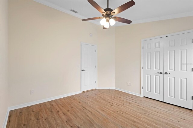 2263 Catbriar Way, Oviedo, FL 32765 - unfurnished bedroom featuring light wood-style flooring, ornamental molding, a closet, and a ceiling fan