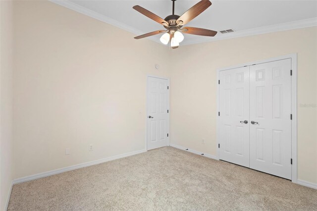 2263 Catbriar Way, Oviedo, FL 32765 - unfurnished bedroom featuring ornamental molding, light colored carpet, a closet, and ceiling fan