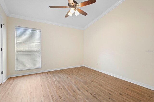 2263 Catbriar Way, Oviedo, FL 32765 - empty room featuring light wood-style flooring, ornamental molding, and a ceiling fan
