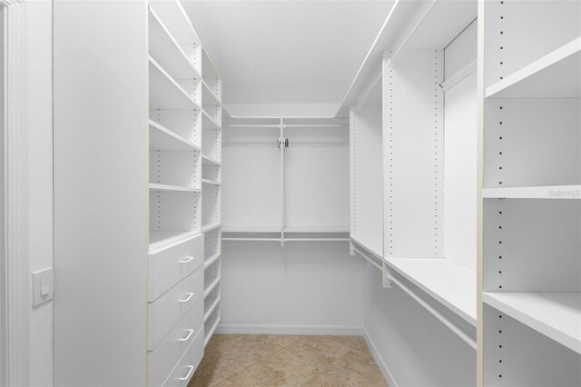 2263 Catbriar Way, Oviedo, FL 32765 - spacious closet featuring tile patterned flooring