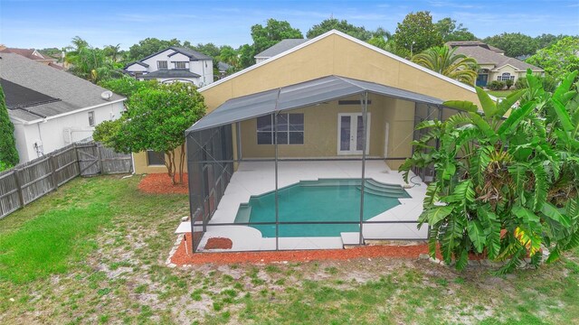 2263 Catbriar Way, Oviedo, FL 32765 - rear view of house with a patio area, a fenced backyard, a lanai, and stucco siding