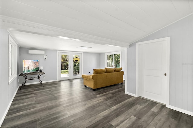 812 Faulkner St, New Smyrna Beach, FL 32168 - living room with an AC wall unit, french doors, dark wood-style flooring, and lofted ceiling