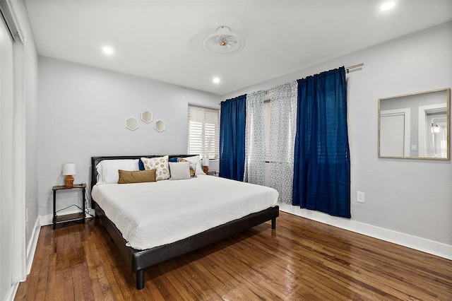 812 Faulkner St, New Smyrna Beach, FL 32168 - bedroom featuring wood-type flooring and recessed lighting