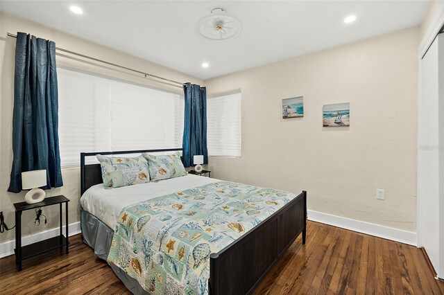 812 Faulkner St, New Smyrna Beach, FL 32168 - bedroom featuring dark wood-style flooring and recessed lighting