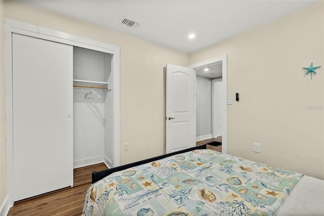 812 Faulkner St, New Smyrna Beach, FL 32168 - bedroom with wood finished floors, a closet, and recessed lighting