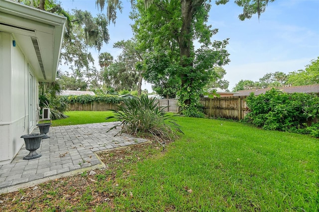 812 Faulkner St, New Smyrna Beach, FL 32168 - fenced backyard with a patio