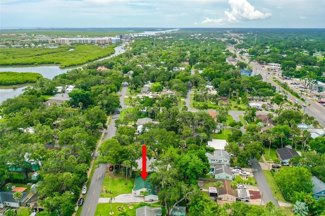 812 Faulkner St, New Smyrna Beach, FL 32168 - aerial view of property's location with a nearby body of water and nearby suburban area