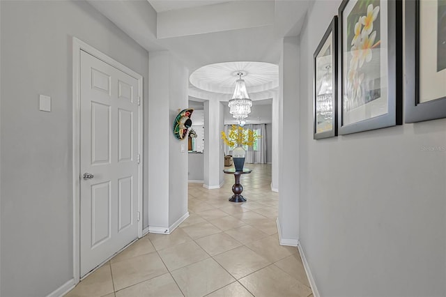 31 Abacus Ave, Ormond Beach, FL 32174 - corridor with a chandelier and light tile patterned floors