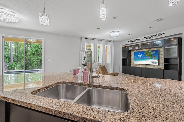 31 Abacus Ave, Ormond Beach, FL 32174 - kitchen featuring stone counters, recessed lighting, and pendant lighting