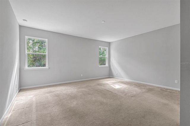31 Abacus Ave, Ormond Beach, FL 32174 - carpeted empty room featuring healthy amount of natural light