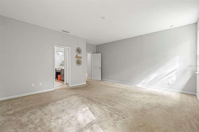 31 Abacus Ave, Ormond Beach, FL 32174 - unfurnished bedroom with light colored carpet and connected bathroom