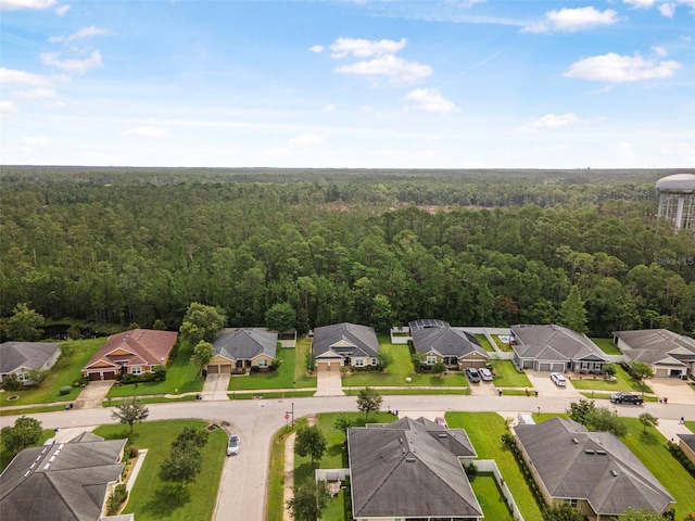 31 Abacus Ave, Ormond Beach, FL 32174 - aerial perspective of suburban area with a forest