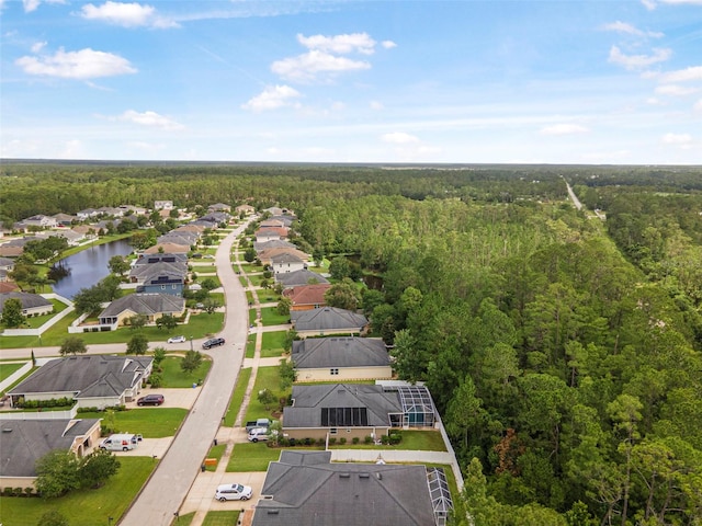 31 Abacus Ave, Ormond Beach, FL 32174 - aerial perspective of suburban area featuring a forest and a nearby body of water