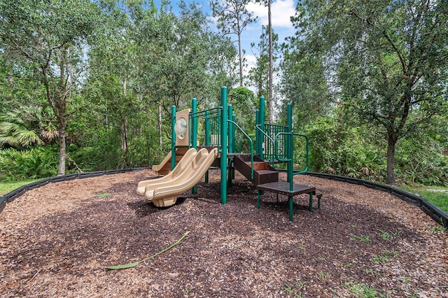 31 Abacus Ave, Ormond Beach, FL 32174 - community play area with view of wooded area
