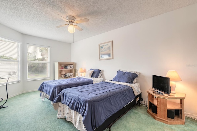 961 S Lakewood Ter Unit C, Port Orange, FL 32127 - carpeted bedroom featuring a textured ceiling and a ceiling fan