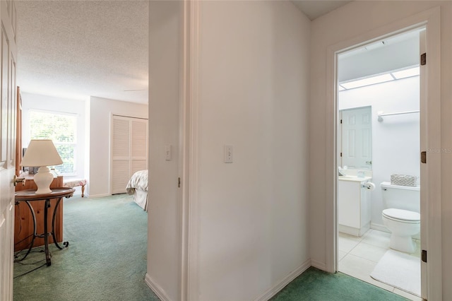 961 S Lakewood Ter Unit C, Port Orange, FL 32127 - hall featuring carpet flooring and a textured ceiling