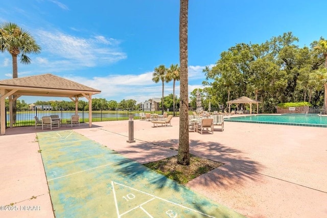 961 S Lakewood Ter Unit C, Port Orange, FL 32127 - view of home's community with a gazebo, shuffleboard, a swimming pool, and a water view