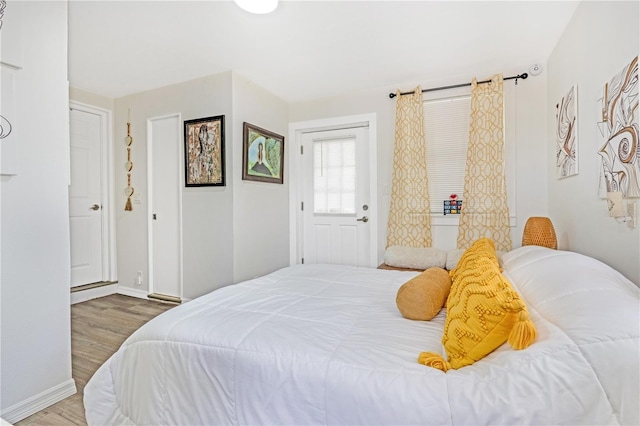 1455 Whitewood Dr, Deltona, FL 32725 - bedroom with wood finished floors and baseboards