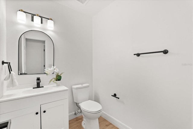 3655 Scott St, Port Orange, FL 32129 - half bath featuring vanity and wood finished floors