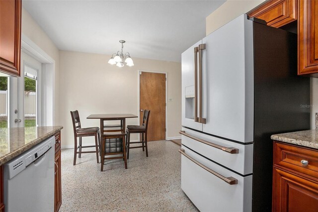 502 W Hogle Ave, Deland, FL 32720 - dining area featuring a chandelier and dark speckled floor