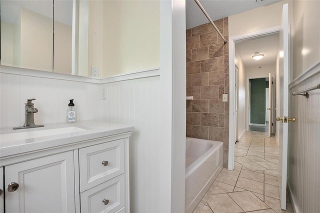 502 W Hogle Ave, Deland, FL 32720 - bathroom with vanity, shower / washtub combination, wainscoting, and tile patterned flooring