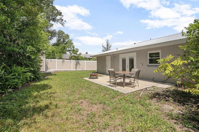 502 W Hogle Ave, Deland, FL 32720 - view of yard featuring french doors and a patio