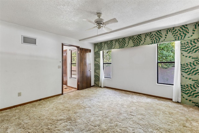 8 Rising Moon Trl, Ormond Beach, FL 32174 - carpeted empty room with a textured ceiling and ceiling fan