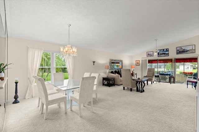123 Wood Ibis Ct, Daytona Beach, FL 32119 - dining space featuring a chandelier, carpet flooring, plenty of natural light, and lofted ceiling