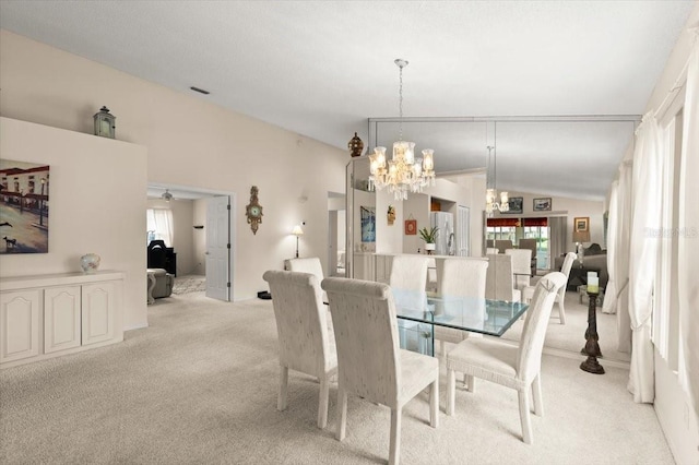 123 Wood Ibis Ct, Daytona Beach, FL 32119 - dining area featuring carpet floors, plenty of natural light, a chandelier, vaulted ceiling, and ceiling fan