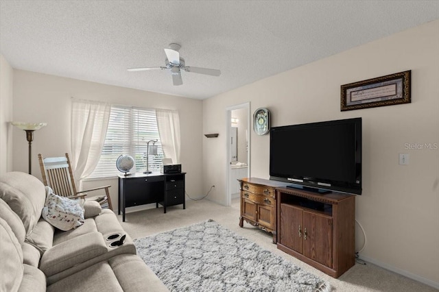 123 Wood Ibis Ct, Daytona Beach, FL 32119 - living room with a ceiling fan, light carpet, and a textured ceiling