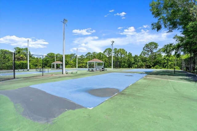 123 Wood Ibis Ct, Daytona Beach, FL 32119 - view of community featuring a tennis court