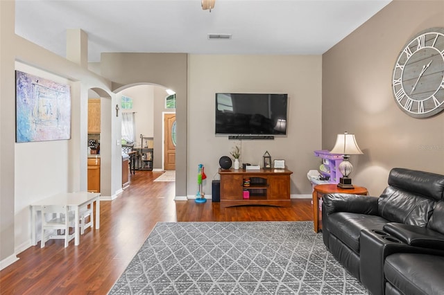 3 Kanawha Ct, Palm Coast, FL 32164 - living area with arched walkways and wood finished floors