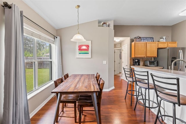3 Kanawha Ct, Palm Coast, FL 32164 - dining room featuring dark wood finished floors
