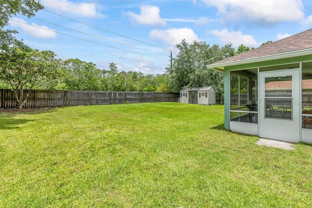 3 Kanawha Ct, Palm Coast, FL 32164 - fenced backyard featuring a shed and a sunroom