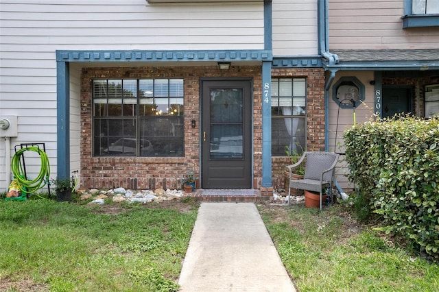 874 Commonwealth Ct, Casselberry, FL 32707 - property entrance with brick siding