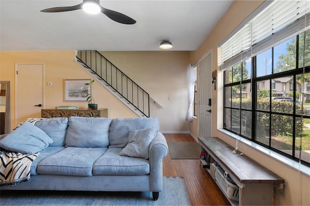 874 Commonwealth Ct, Casselberry, FL 32707 - living room featuring wood finished floors, a ceiling fan, and stairway