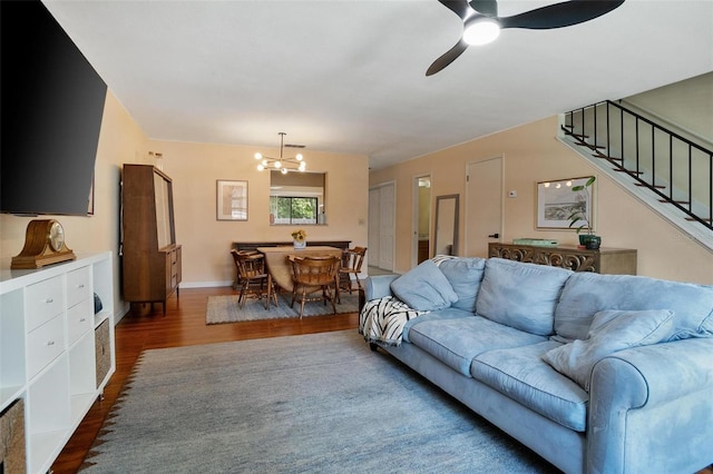 874 Commonwealth Ct, Casselberry, FL 32707 - living area with a chandelier, wood finished floors, stairs, and a ceiling fan