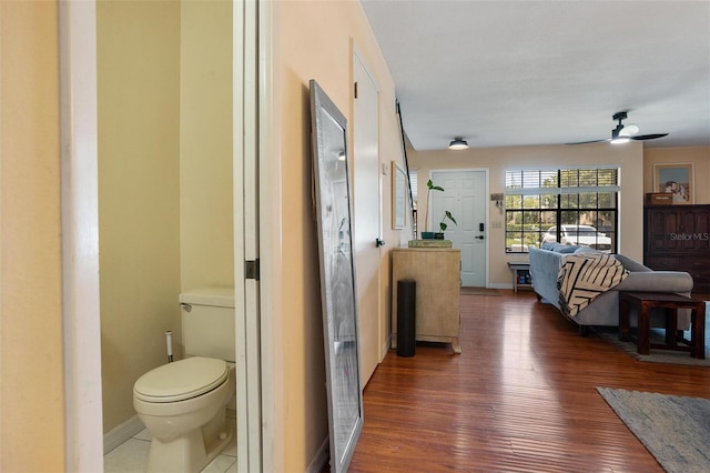 874 Commonwealth Ct, Casselberry, FL 32707 - hall featuring wood finished floors and baseboards
