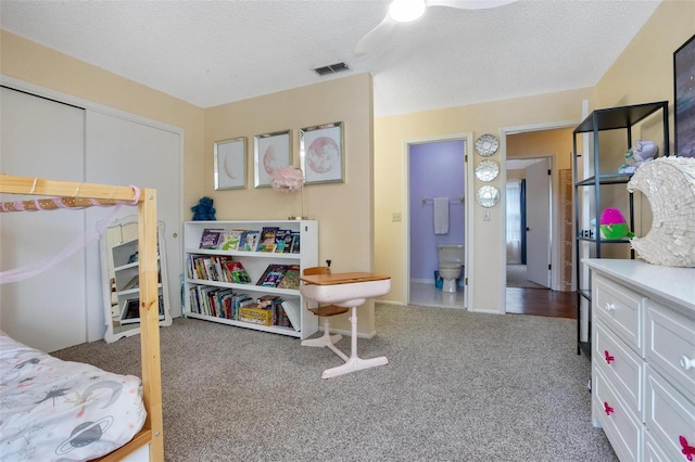 874 Commonwealth Ct, Casselberry, FL 32707 - bedroom with carpet floors, a textured ceiling, a closet, and ceiling fan