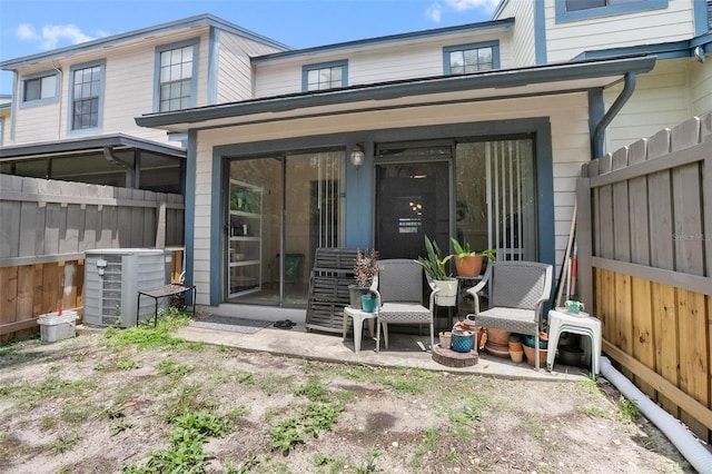 874 Commonwealth Ct, Casselberry, FL 32707 - back of house with a sunroom